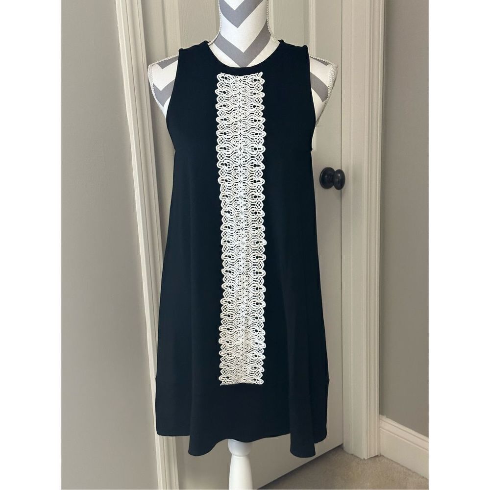 Sleeveless lace embellished black dress
